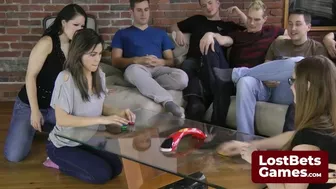 Four lucky guys participate in a strip game and enjoy watching the girls strip down