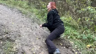 girl in high-heeled boots wants to go to home, but there is dirty slippery slide on the way