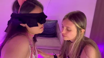 Two flirtatious lesbians playing at dominating each other.