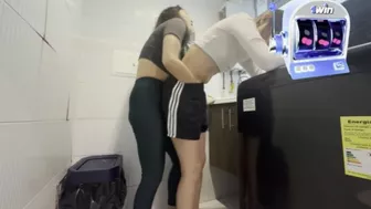 Two lesbians have a secret in the laundry room.