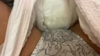 Peeing in panties inside a diaper