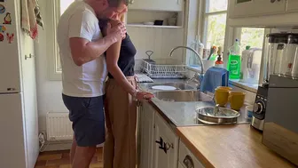 Hot housewife milf makes husband horny while doing the dishes and he fucks her from behind