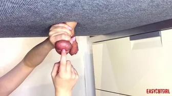 Mistress points finger at balls and bangs them with her finger EasyCBTGirl